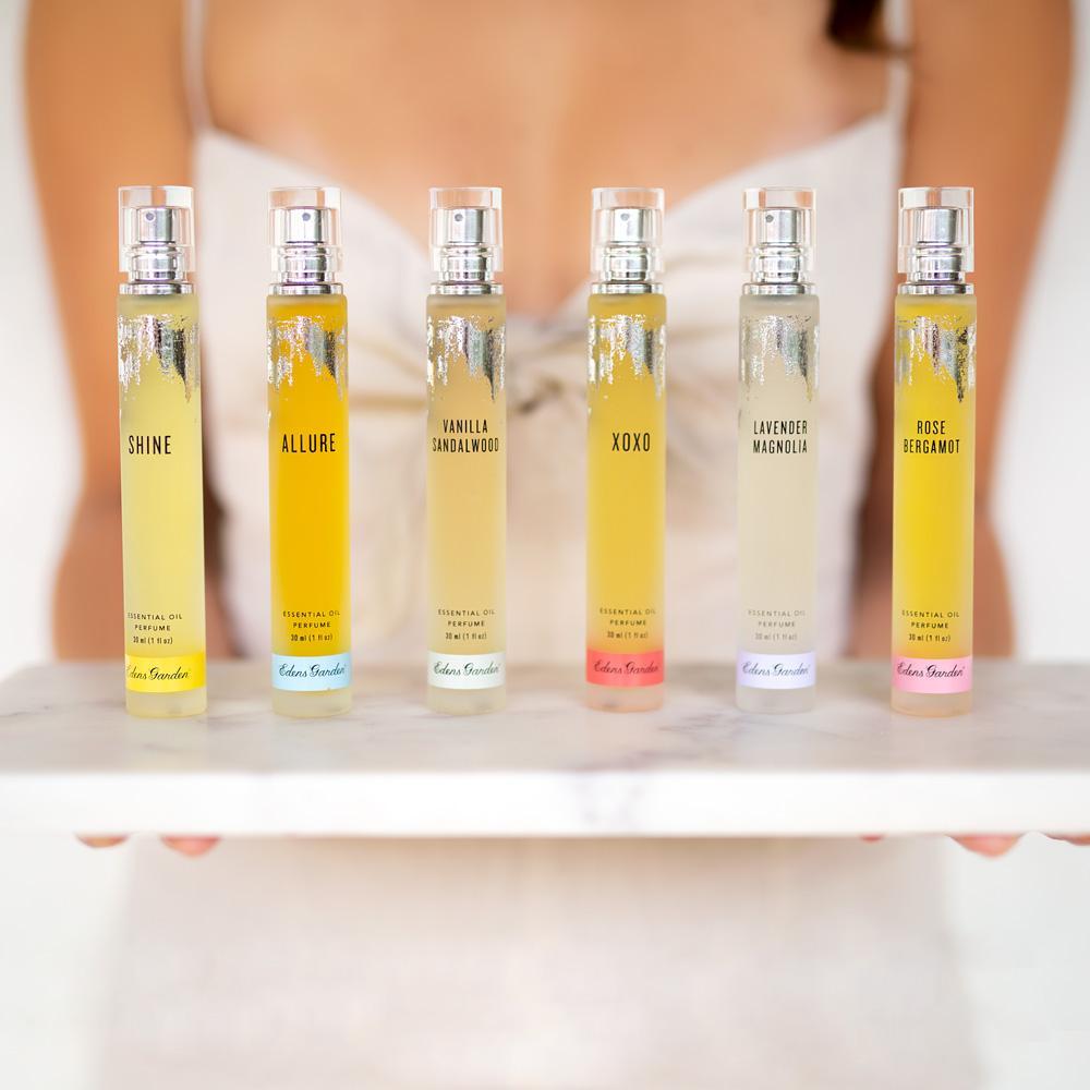 A tray of Edens Garden perfumes