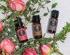 Essential oils surrounded by roses