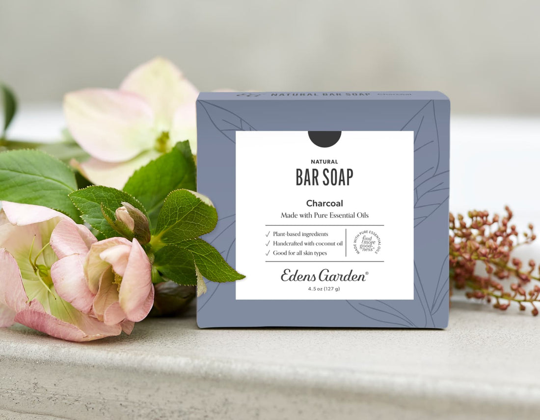 Natural Charcoal Bar Soap next to a flower