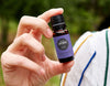 Hand holding Lavender- French essential oil