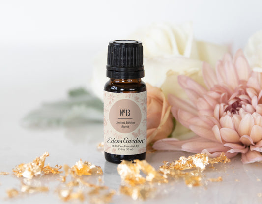 N°13 Limited Edition Blend surrounded by gold dust and flowers 