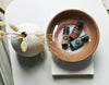 Essential oils in a brown bowl