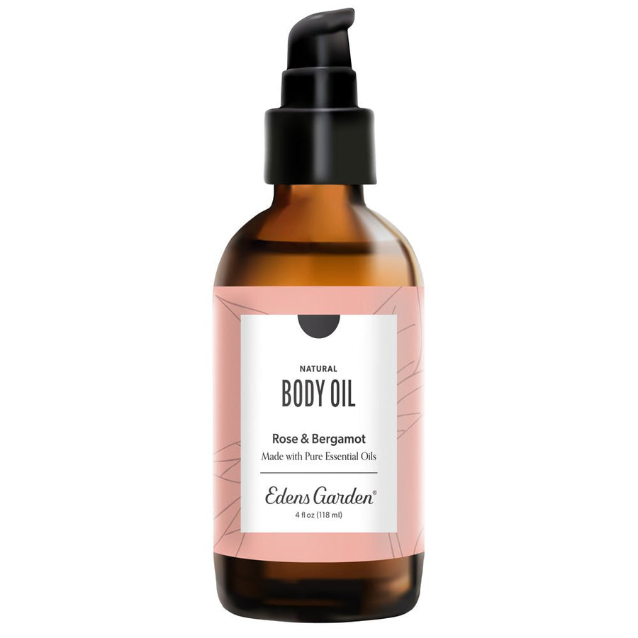 Brown bottle of Edens Garden body oil with a white label on a white background