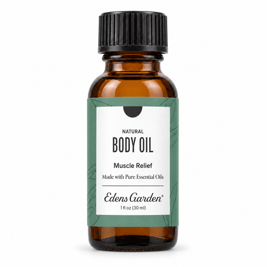 Edens Garden Natural Body Oil Muscle Relief in a 1 fl oz amber glass bottle with a black ribbed cap and a green and white label.
