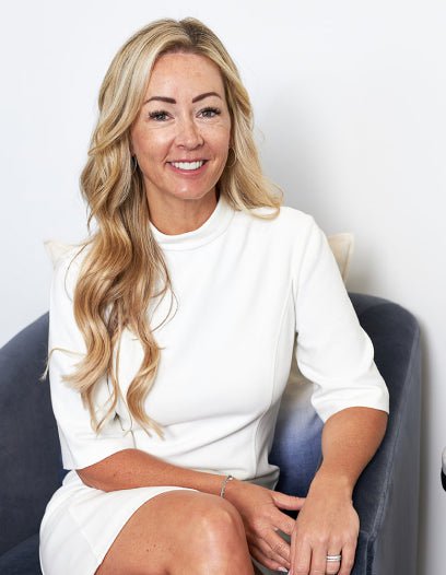 Grace Martin, Edens Garden's founder, sitting in a relaxed position