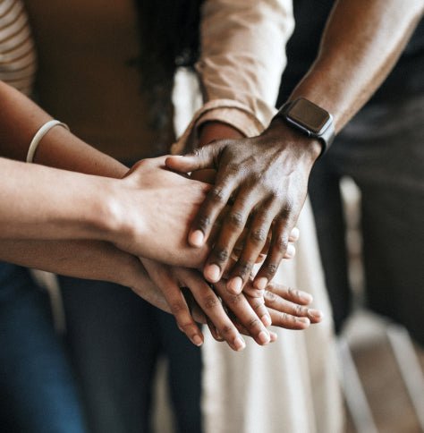 People putting their hands together