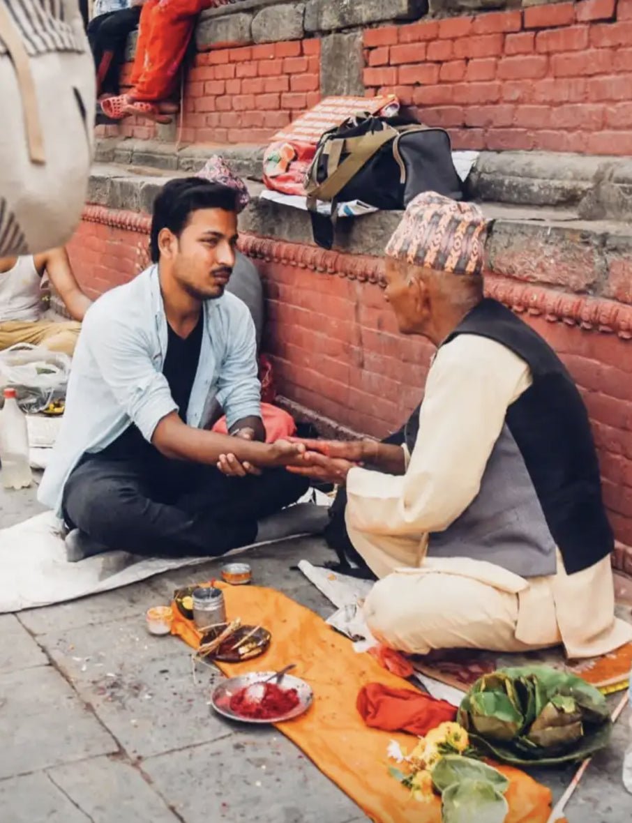 A promotional image of two men talking for the YWAM organization