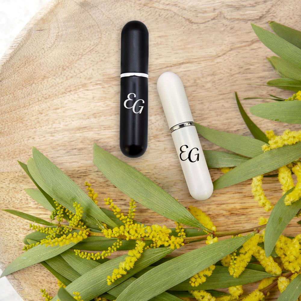 Lifestyle image of the black and white Essential Oil Inhalers by Edens Garden
