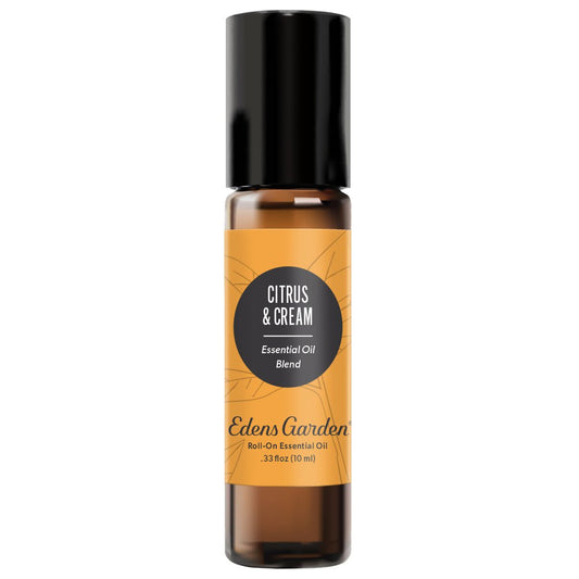 A black roll-on essential oil bottle with a label reading 'Citrus & Cream Essential Oil Blend' by Edens Garden.
