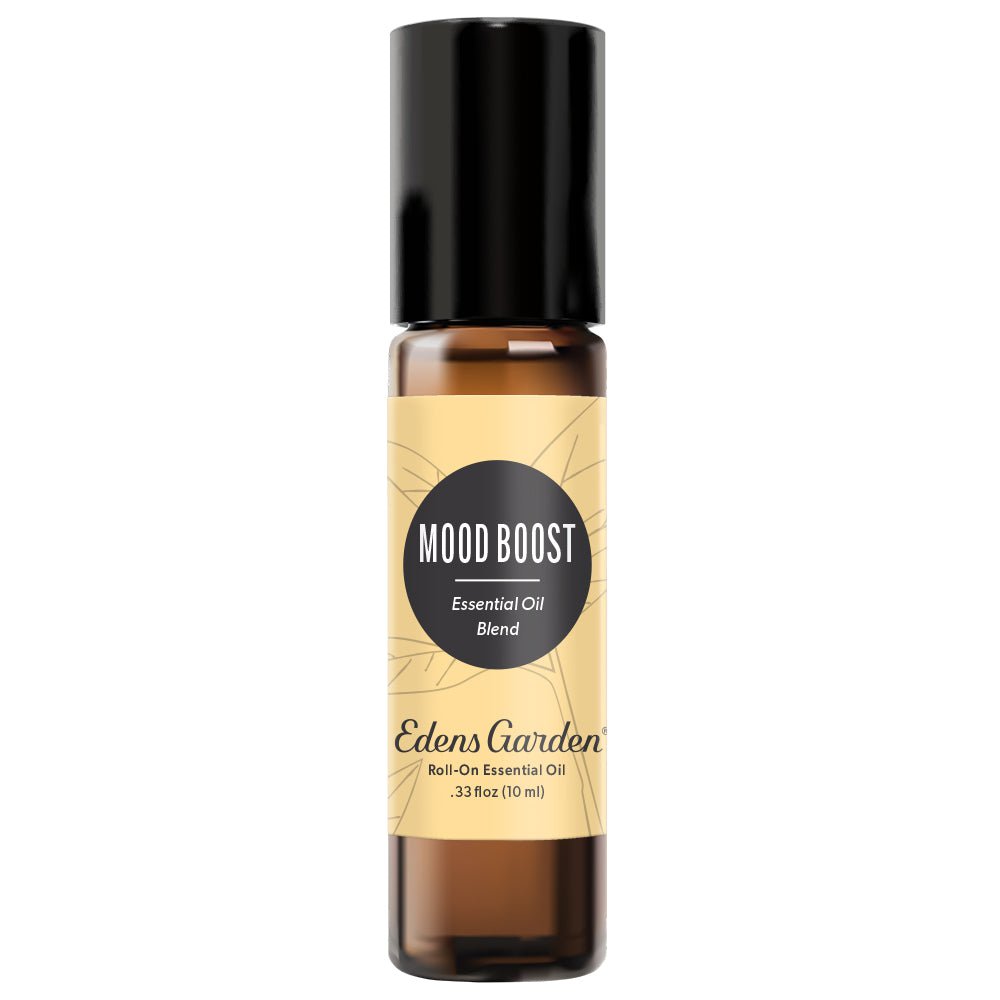 A black roll-on essential oil bottle with a label reading 'Mood Boost' by Edens Garden.
