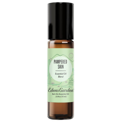 A clear glass roll-on bottle with a black cap labeled 'Pampered Skin Essential Oil Blend' by Edens Garden.