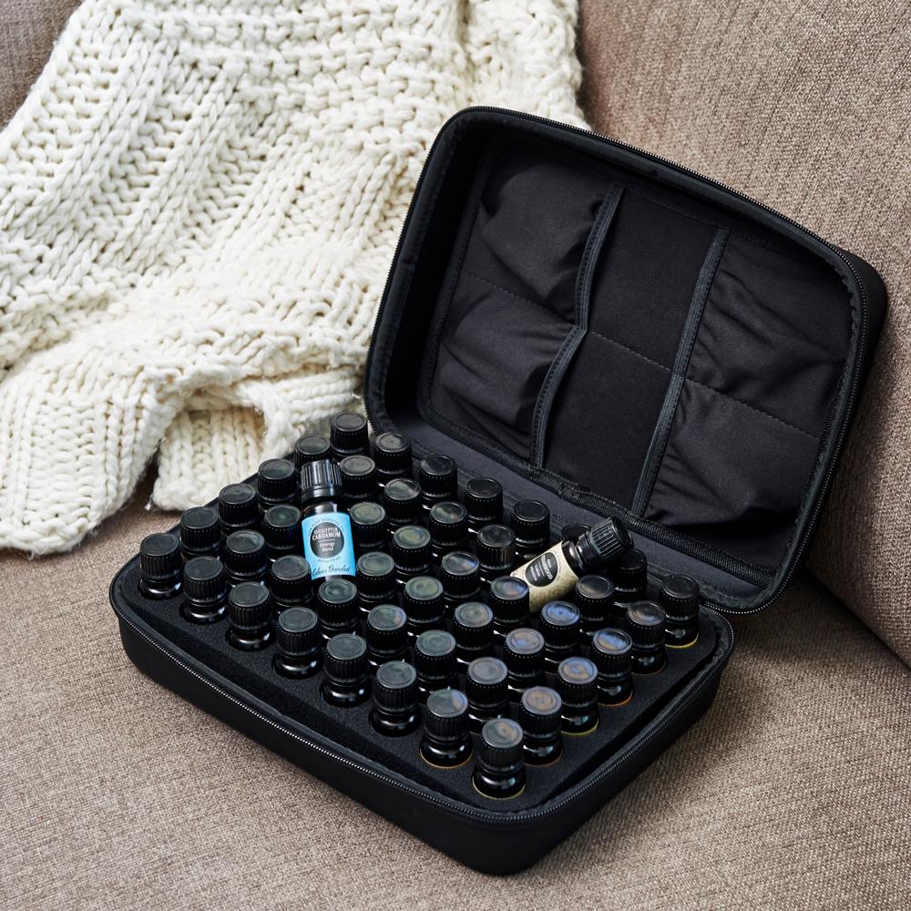 Open Essential Oil Carry Case by Edens Garden filled with essential oil bottles