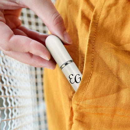 Lifestyle image of woman holding the Essential Oil Inhaler by Edens Garden