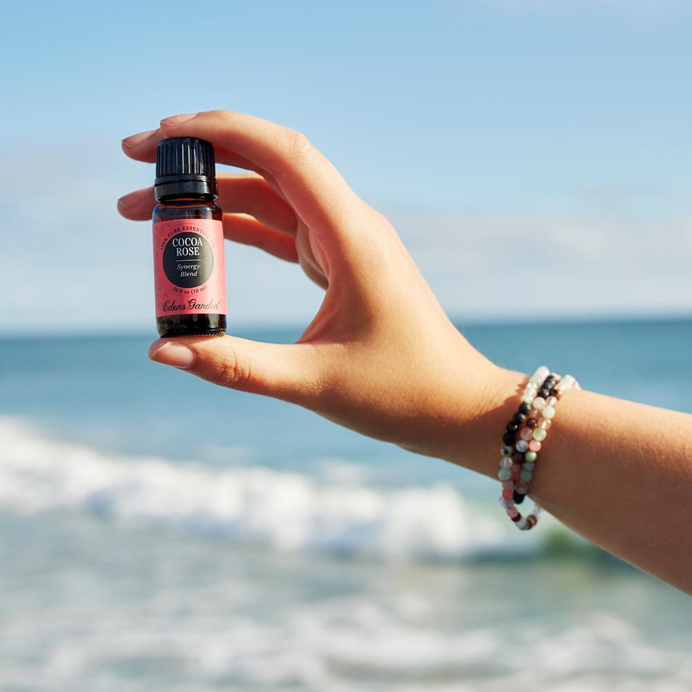 girl with Edens garden essential oil for aromatherapy diffuser jewelry 