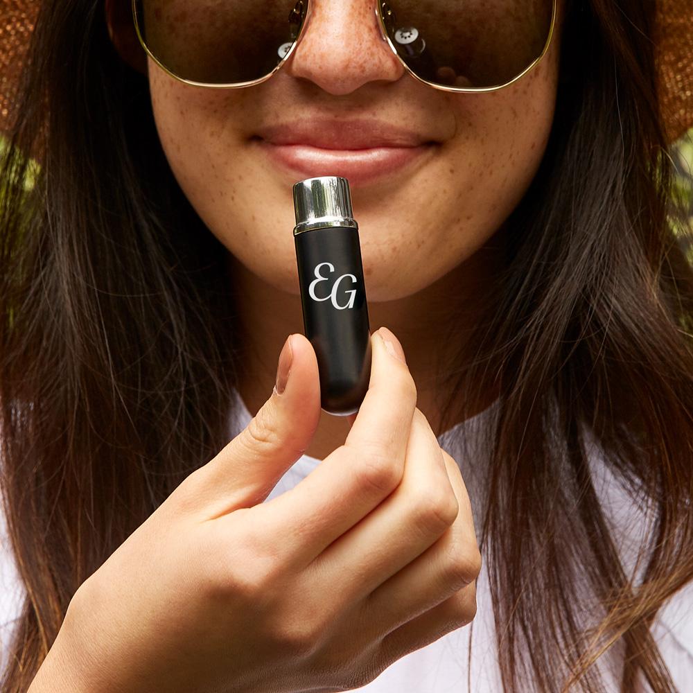 Lifestyle image of woman holding the Essential Oil Inhaler by Edens Garden